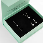 Coffret vert de bijoux argentés avec motifs étoilés