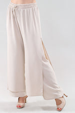 Pantalon ample beige rosé à taille élastique