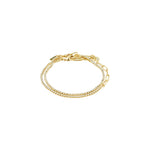 Bague fine dorée à détail noué
