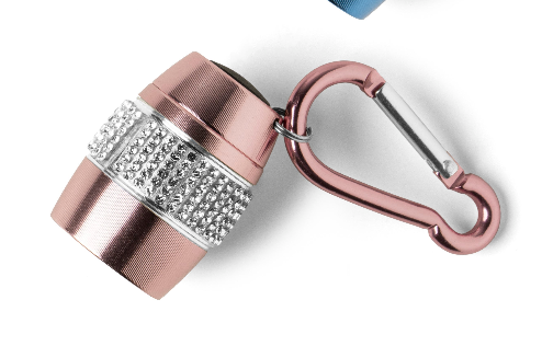 Petit accessoire cylindrique rose métallique avec mousqueton