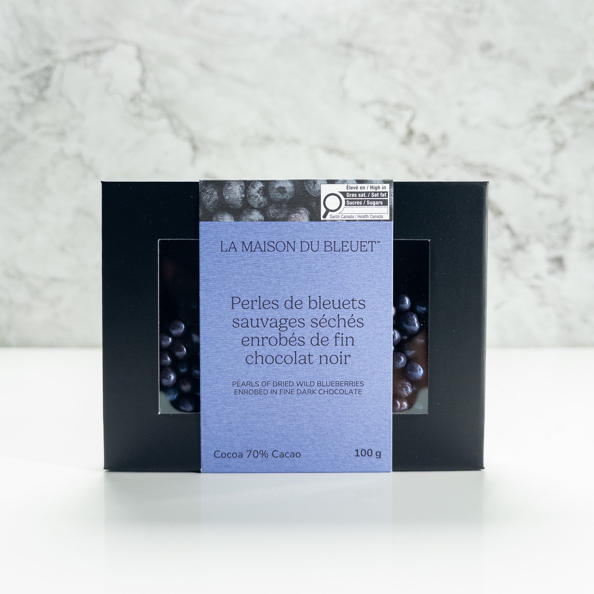 Perles bleues de bleuets séchés enrobés de chocolat noir
