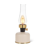 Lampe lanterne DEL ivoire, base en métal, détails dorés et cheminée en verre transparent
