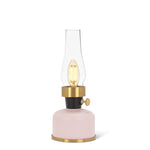 Petite lampe lanterne DEL rose poudré avec base en métal et cheminée en verre transparent