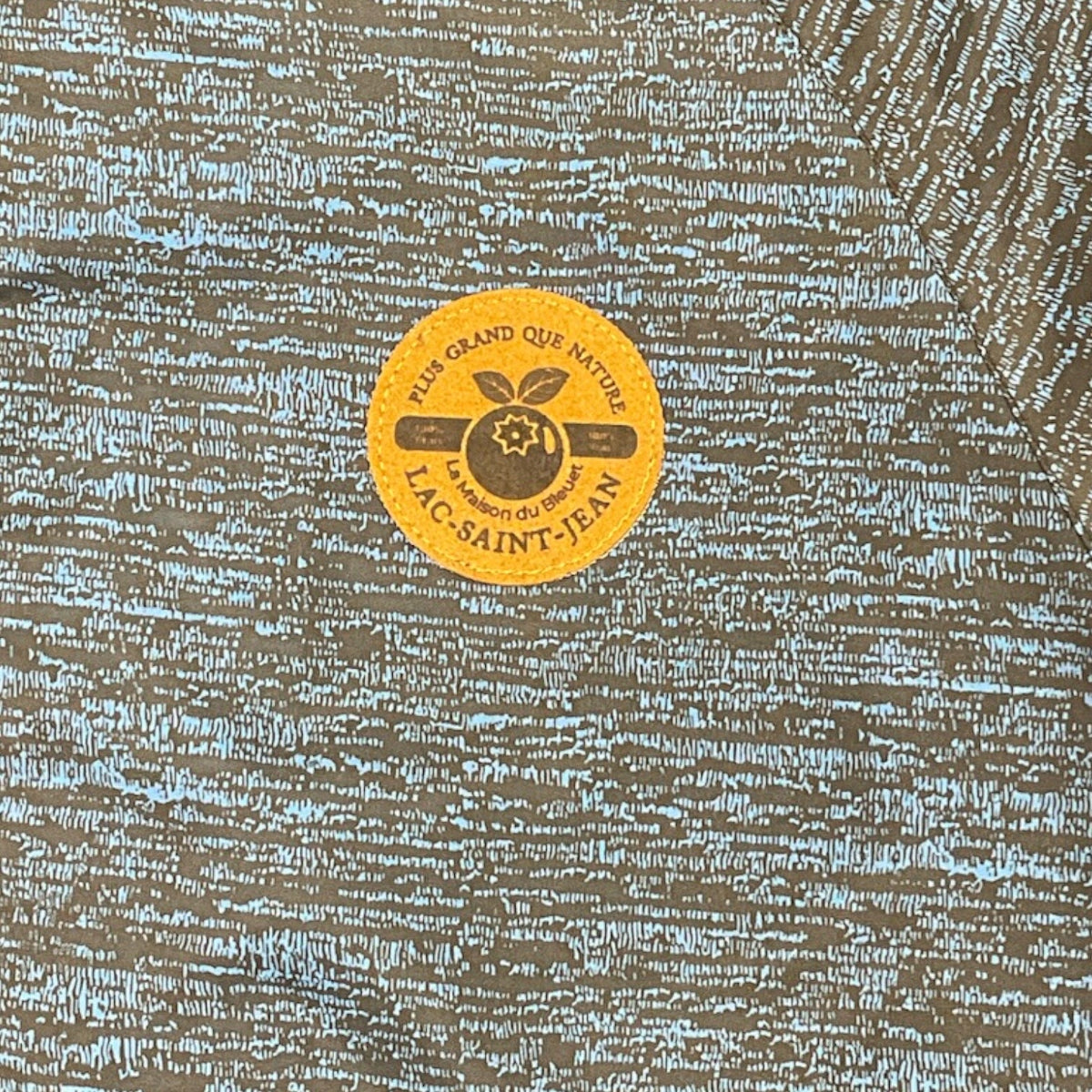 Coupe-vent texturé unisexe – ecusson visible à l'avant du coupe vent