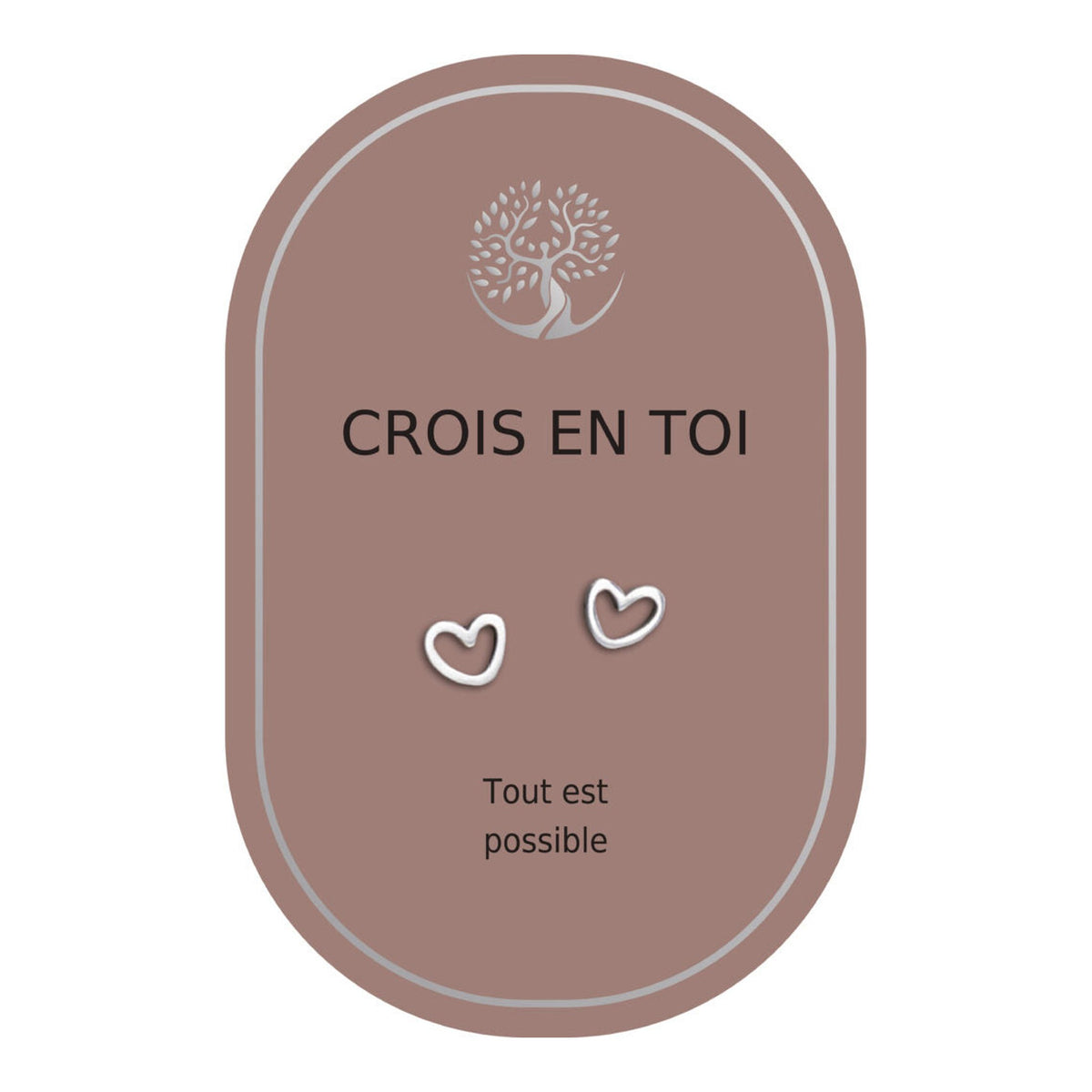 Boucles d’oreilles en cœurs argentés sur carte rose Earth Angel « Crois en toi ».