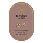 Boucles d’oreilles en cœurs dorés sur carte rose Earth Angel « Je pense à toi ».
