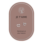 Boucles d’oreilles en cœurs argentés sur carte rose Earth Angel « Je t’aime ».