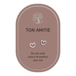 Boucles d’oreilles en cœurs argentés sur carte rose Earth Angel « Ton amitié ».