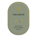 Boucles d’oreilles en cœurs dorés sur carte verte Earth Angel « Ton amitié ».