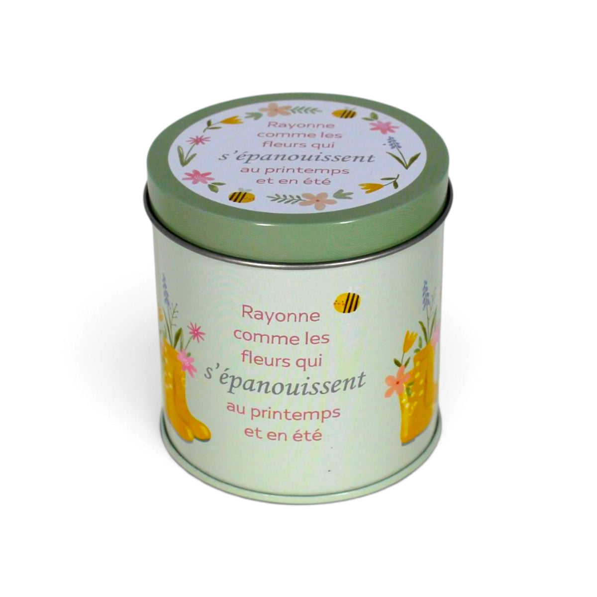 Bougie InnerVoice « Rayonne comme les fleurs qui s’épanouissent au printemps et en été » en boîte métallique verte, avec couvercle fermé et décor floral.