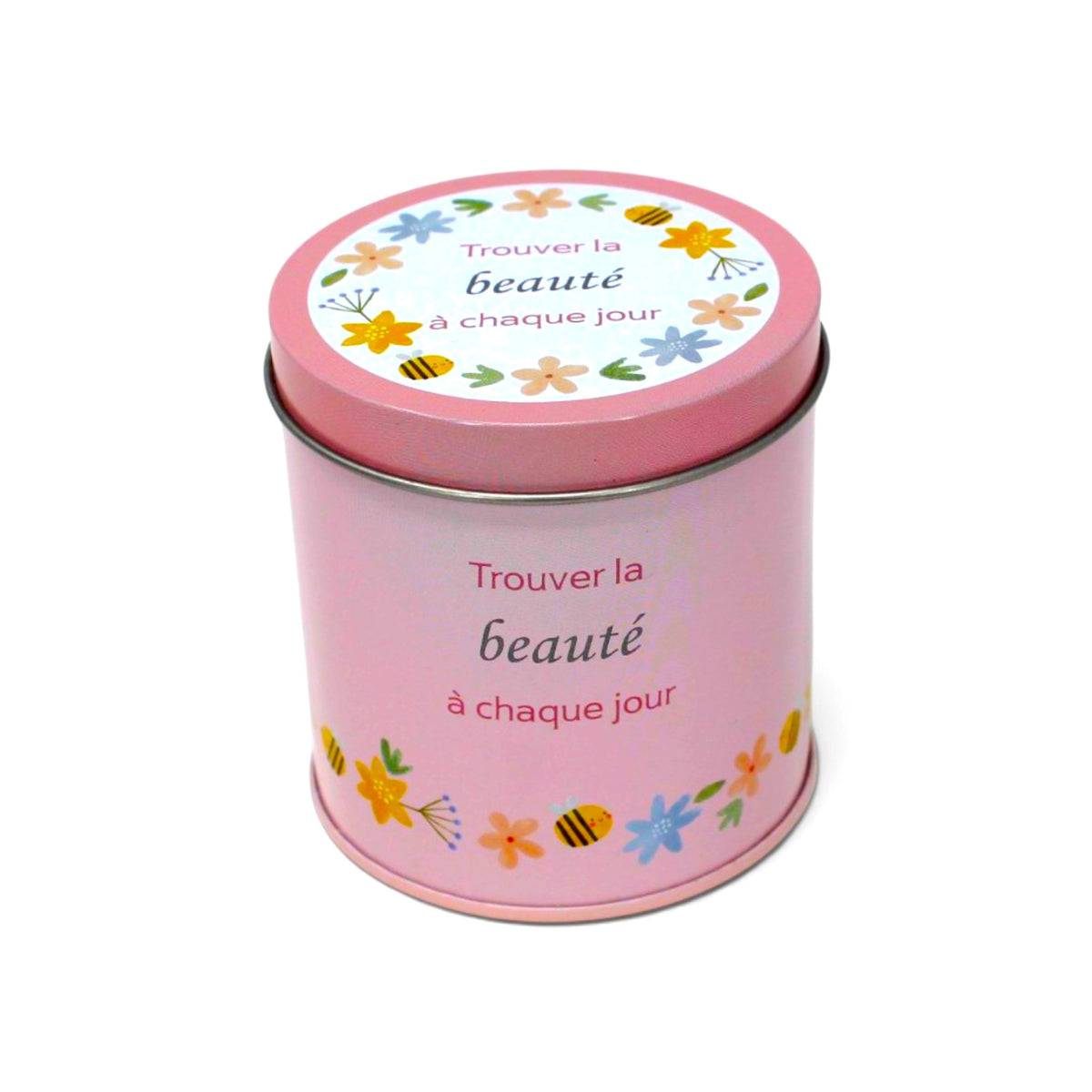 Bougie InnerVoice « Trouver la beauté à chaque jour » en boîte métallique rose, avec couvercle fermé et décor floral.