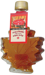 Bouteille en verre en forme de feuille contenant du sirop d’érable North Hatley – 100 ml
