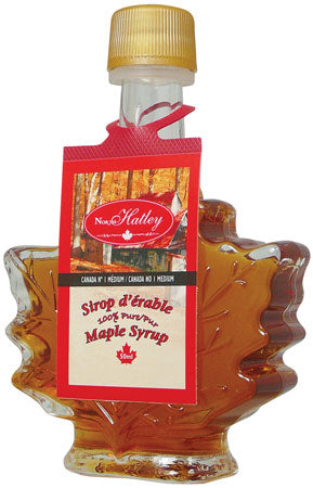 Bouteille en verre en forme de feuille contenant du sirop d’érable North Hatley – 50 ml