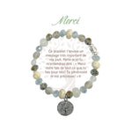 Bracelet Earth Angel « Merci », pierres claires, argenté, avec sa présentation en français.
