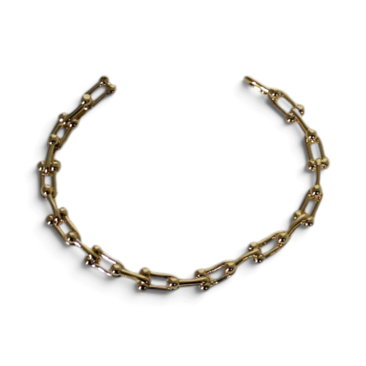 Bracelet Jacqueline Kent à maillons allongés dorés, vue de dessus