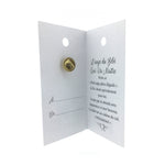 Carte ouverte de l’épinglette « Bébé qui va naître », avec son message en français.