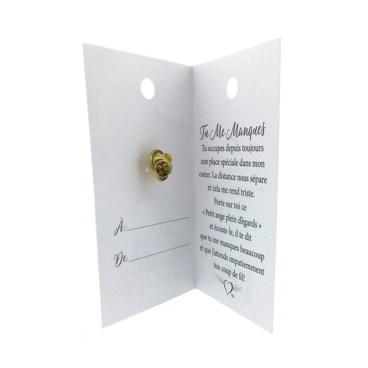 Carte ouverte de l’épinglette « Tu me manques », avec son message en français.