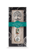 Fil à vœux Arbre de vie Eternity Crystal présenté dans sa boîte illustrée avec son cristal facetté.