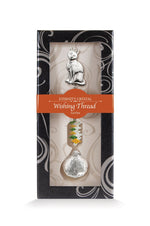 Fil à vœux Chat Eternity Crystal présenté dans sa boîte illustrée avec son cristal facetté.