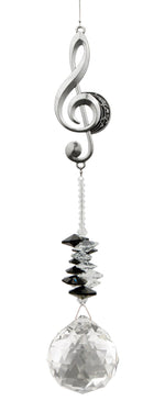 Attrape-soleil Clé de sol Eternity Crystal : motif argenté représentant une clé de sol, perles sombres et cristal transparent facetté.