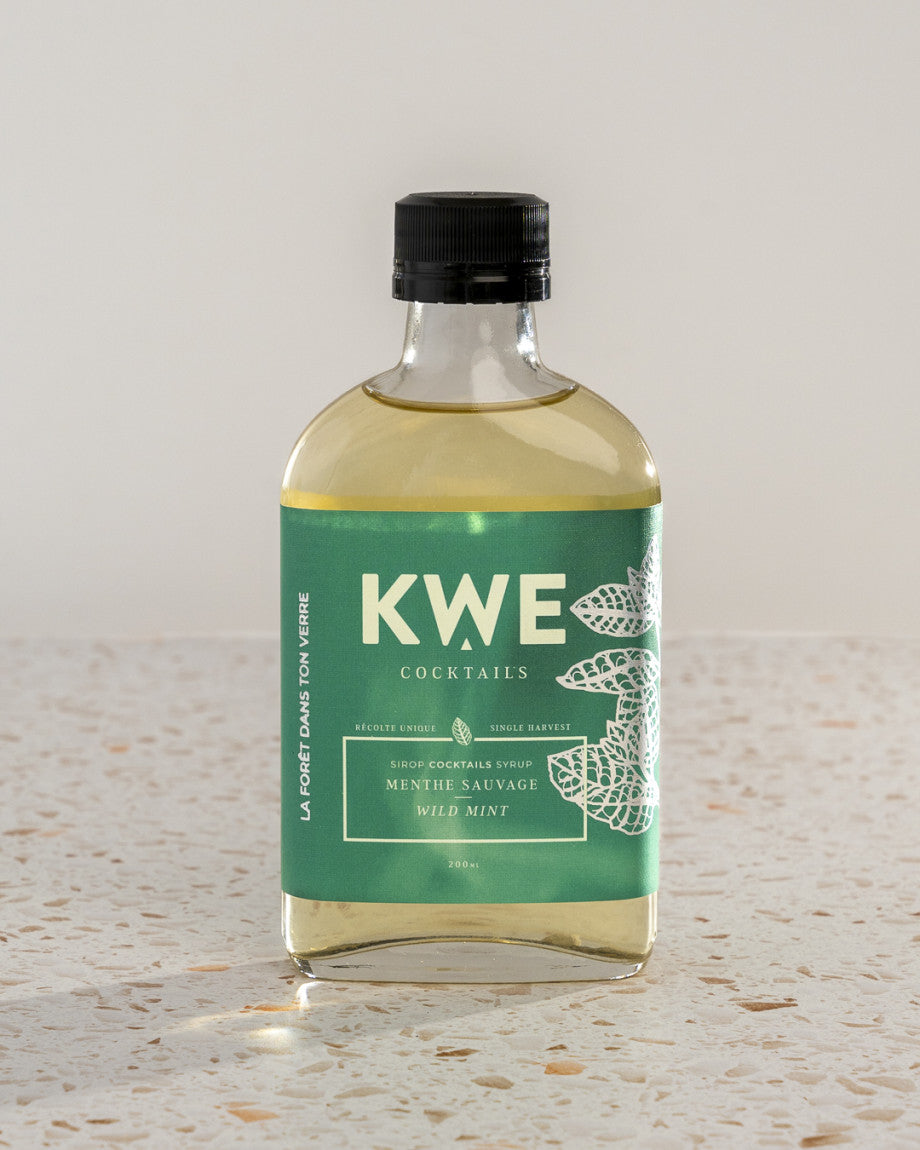 Bouteille de sirop KWE clair à étiquette verte