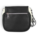 Sac banane Maison Taïga noir en cuir grainé avec détails en fausse fourrure blanche et fermeture éclair argentée