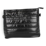 Sac bandoulière Maison Taïga noir en nylon matelassé avec fermeture éclair, design urbain compact et fonctionnel.