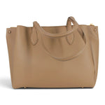 Sac à main Maison Taïga Évasion beige en PVC grainé avec anses doubles pour un port élégant au quotidien