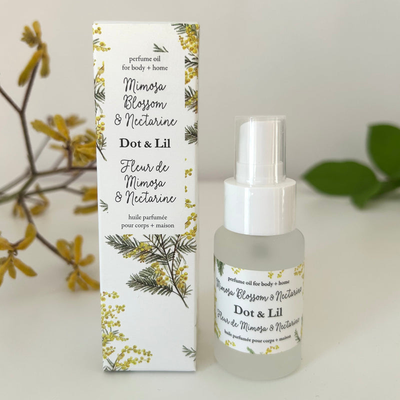 Flacon de parfum Dot & Lil avec étui à motif végétal