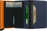 Portefeuille Slimwallet en cuir mat – Secrid, bleu nuit et orange, vue ouverte avec les rangements intérieurs