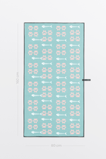 Serviette de plage Solem La Chat-l’Heureuse, verso à motifs sur fond turquoise