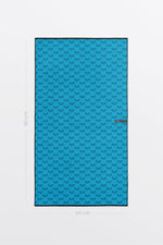 Serviette de sport Solem L’Athlétique, verso à motifs bleus