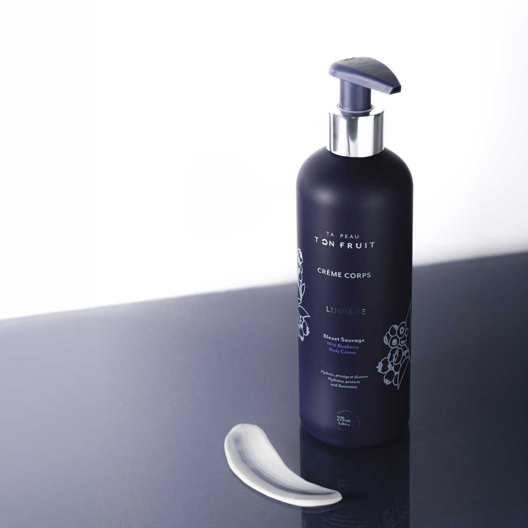 Crème corporelle Lumière avec une touche de crème à sa base — Ta peau, ton fruit
