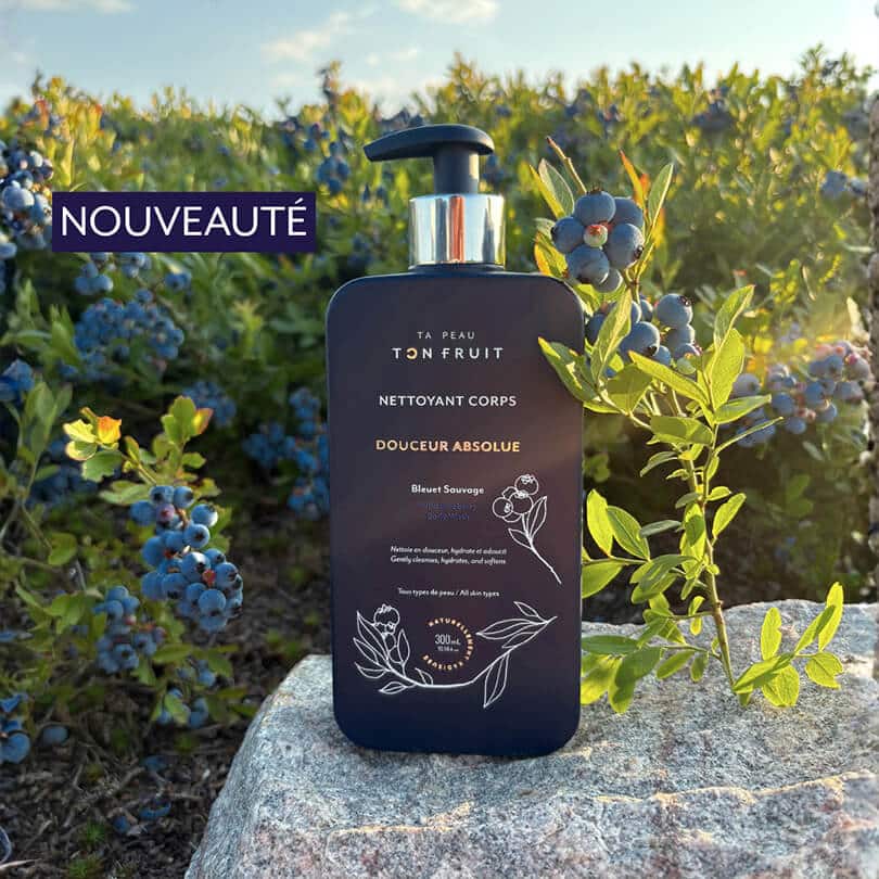 Nettoyant corps Douceur Absolue présenté dans une bleuetière — Ta peau, ton fruit