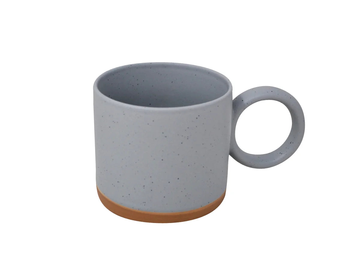 Tasse à poignée ronde bleue