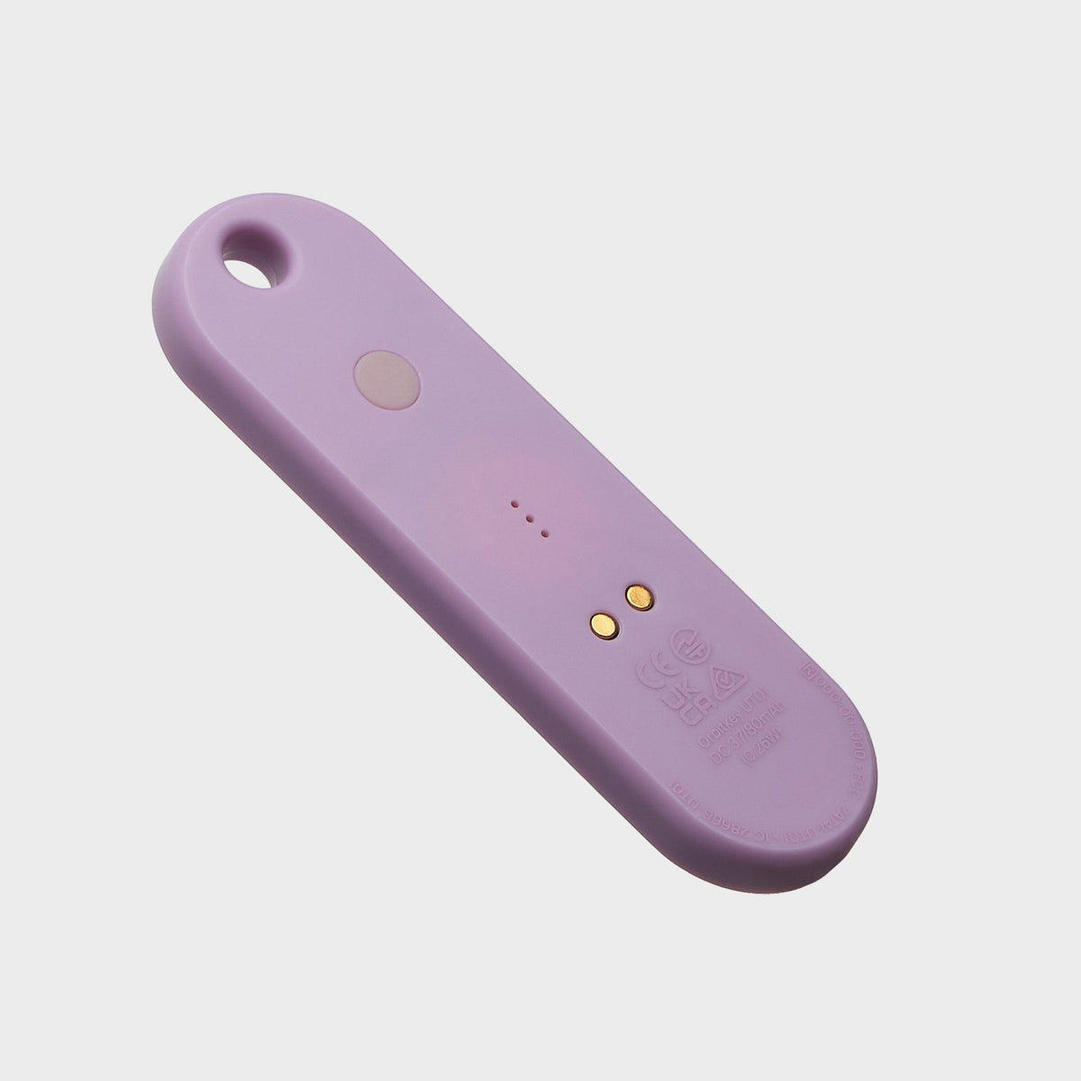 Traceur universel Orbitkey — lilas — face arrière et contacts de recharge