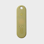 Traceur universel Orbitkey — pistache — face arrière et contacts de recharge