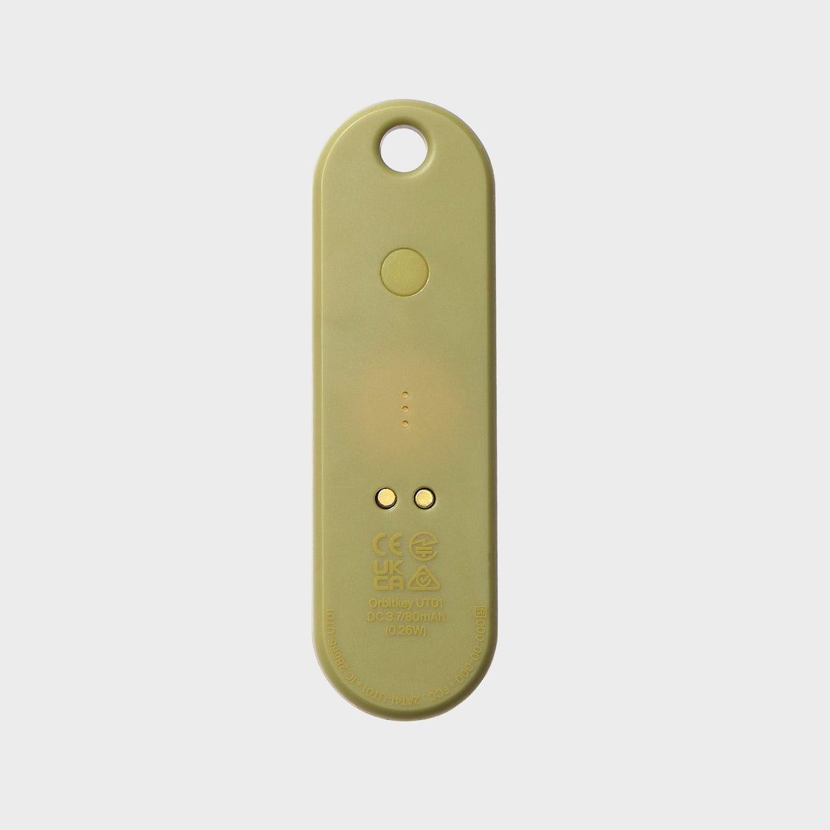 Traceur universel Orbitkey — pistache — face arrière et contacts de recharge