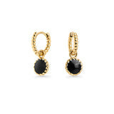 Anneaux dorés avec pendentifs noirs