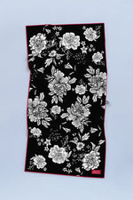 Serviette de plage Solem Simone XL, recto floral noir et blanc